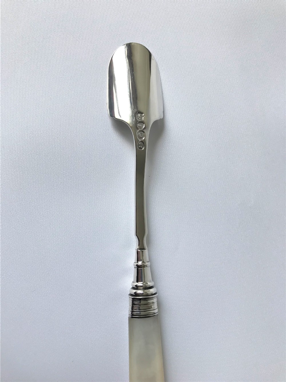 A rare Georgian silver & mother-of-pearl Stilton scoop View V