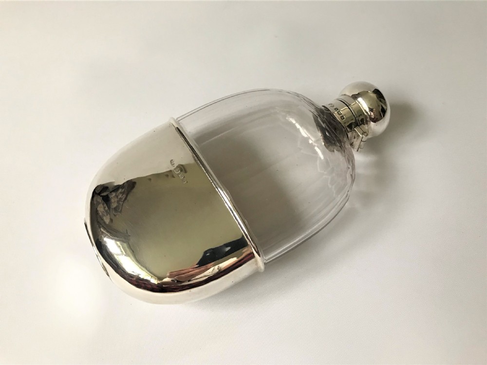 A handsome George V silver mounted hip flask View II