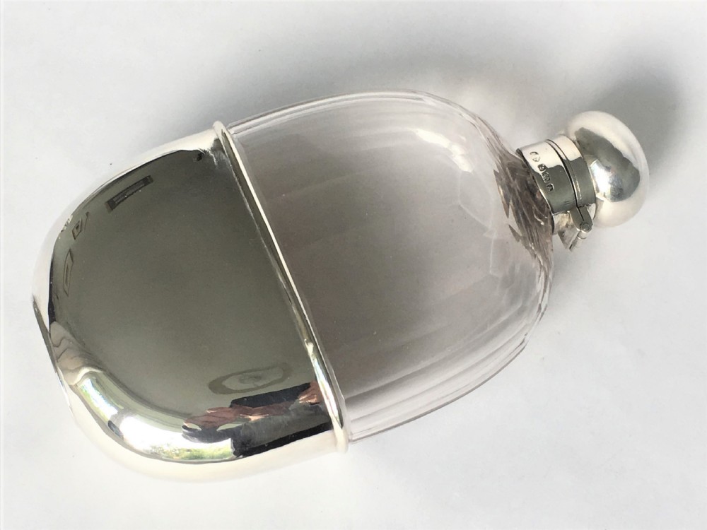 A handsome George V silver mounted hip flask View V