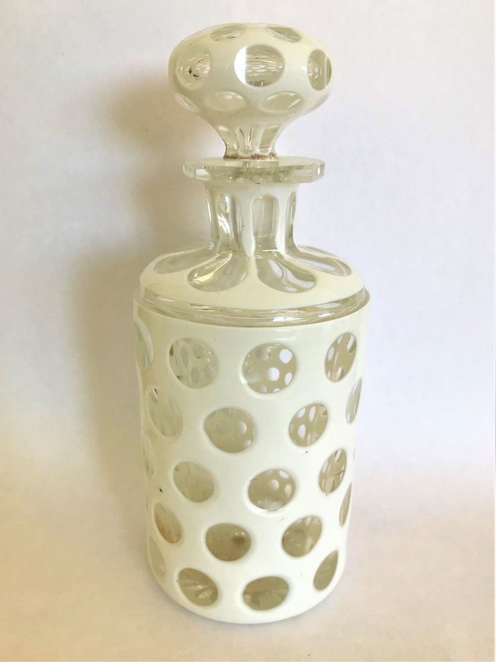 A gorgeous Bohemian overlay cologne bottle