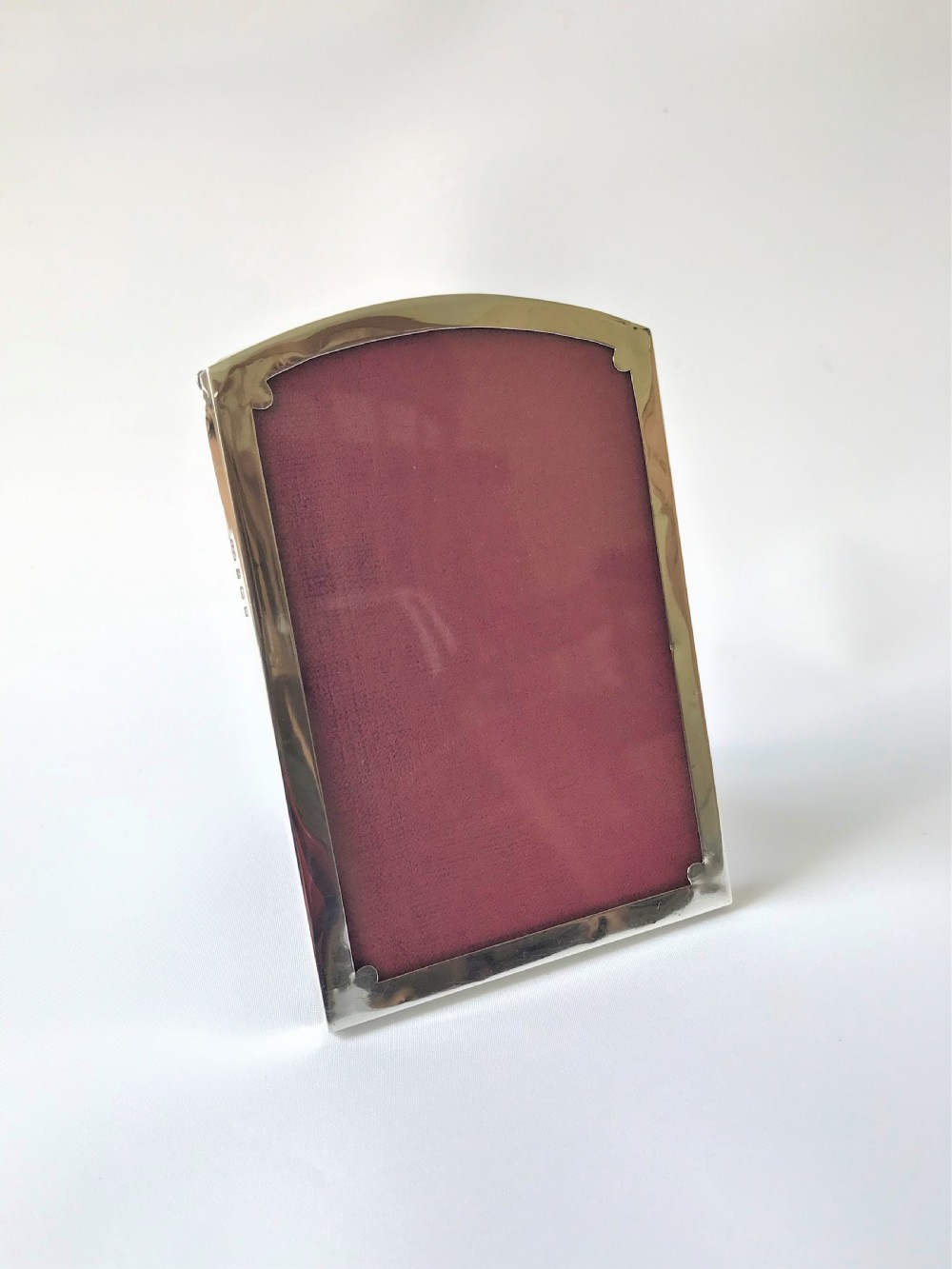 A small Arts & Crafts silver photo frame