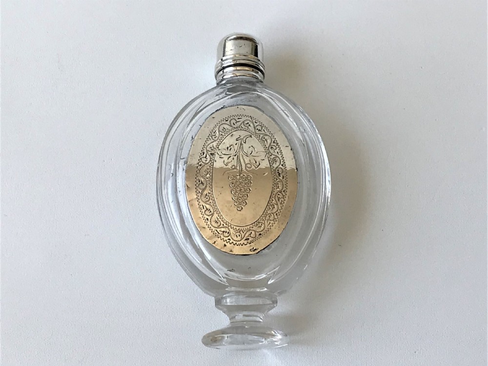 A gorgeous French silver mounted scent bottle