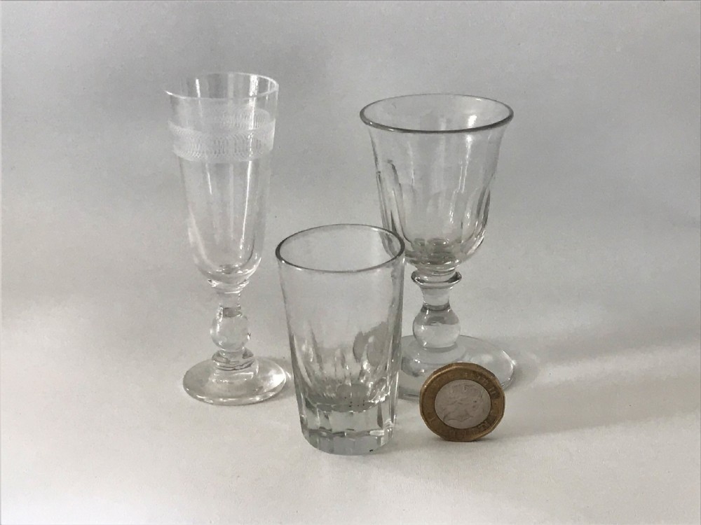 A charming trio of Victorian salesman miniature glasses