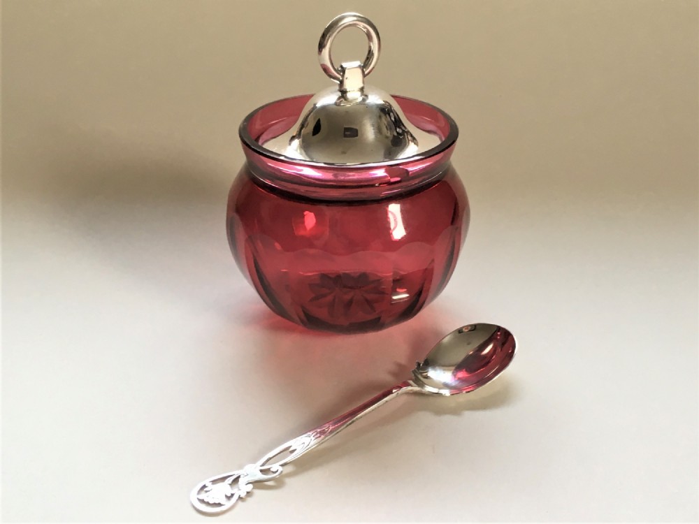 A lovely silver & cranberry preserve jar & spoon