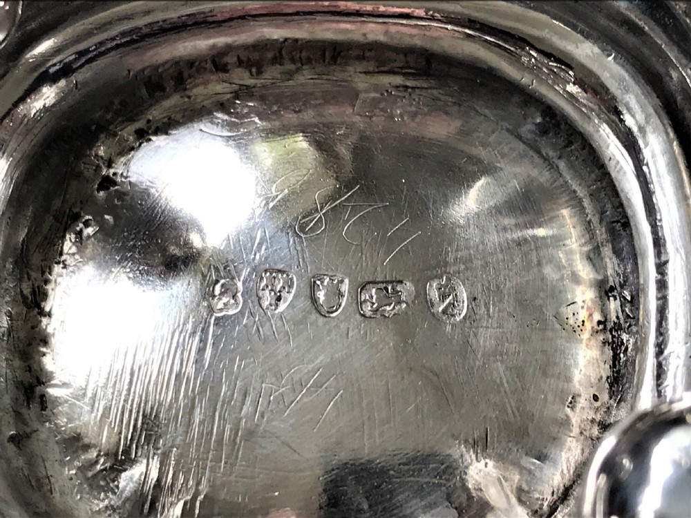 A Georgian Newcastle silver cream jug by a female silversmith View V