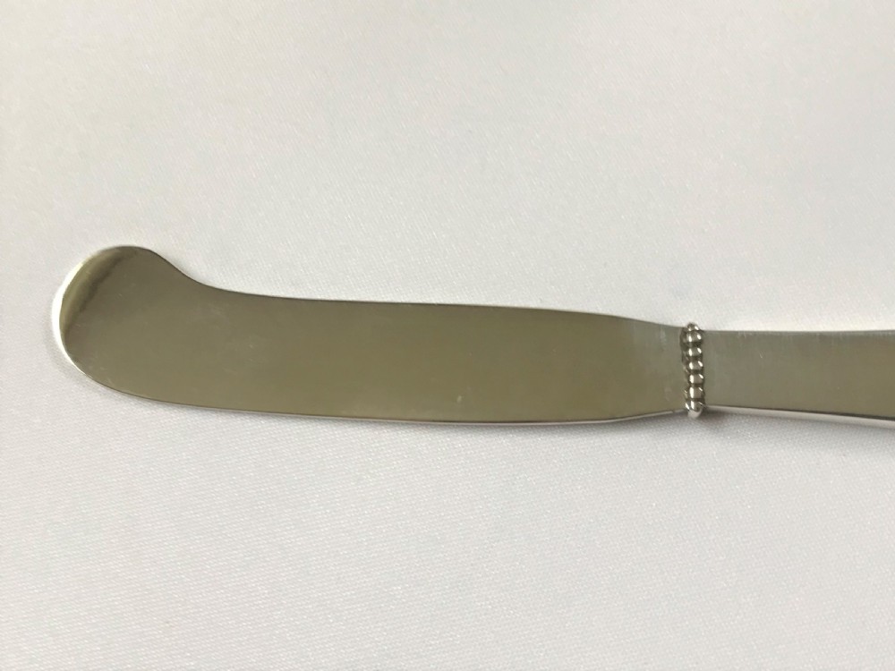 An Arts & Crafts Georg Jensen silver butterknife View III