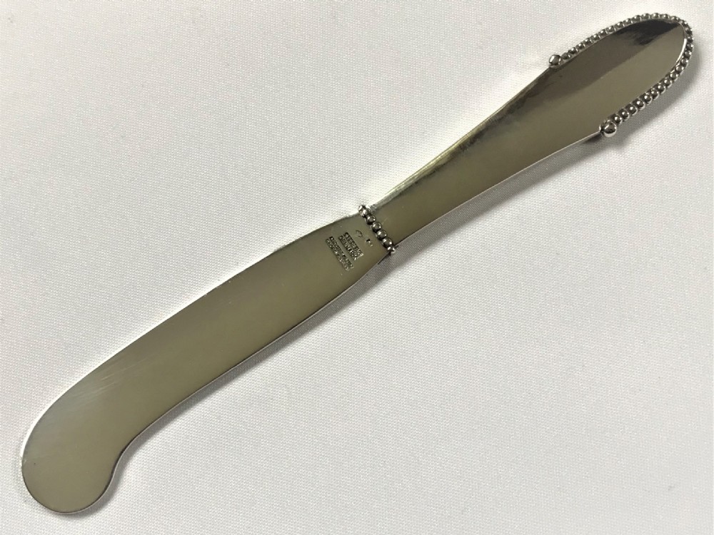 An Arts & Crafts Georg Jensen silver butterknife View IV