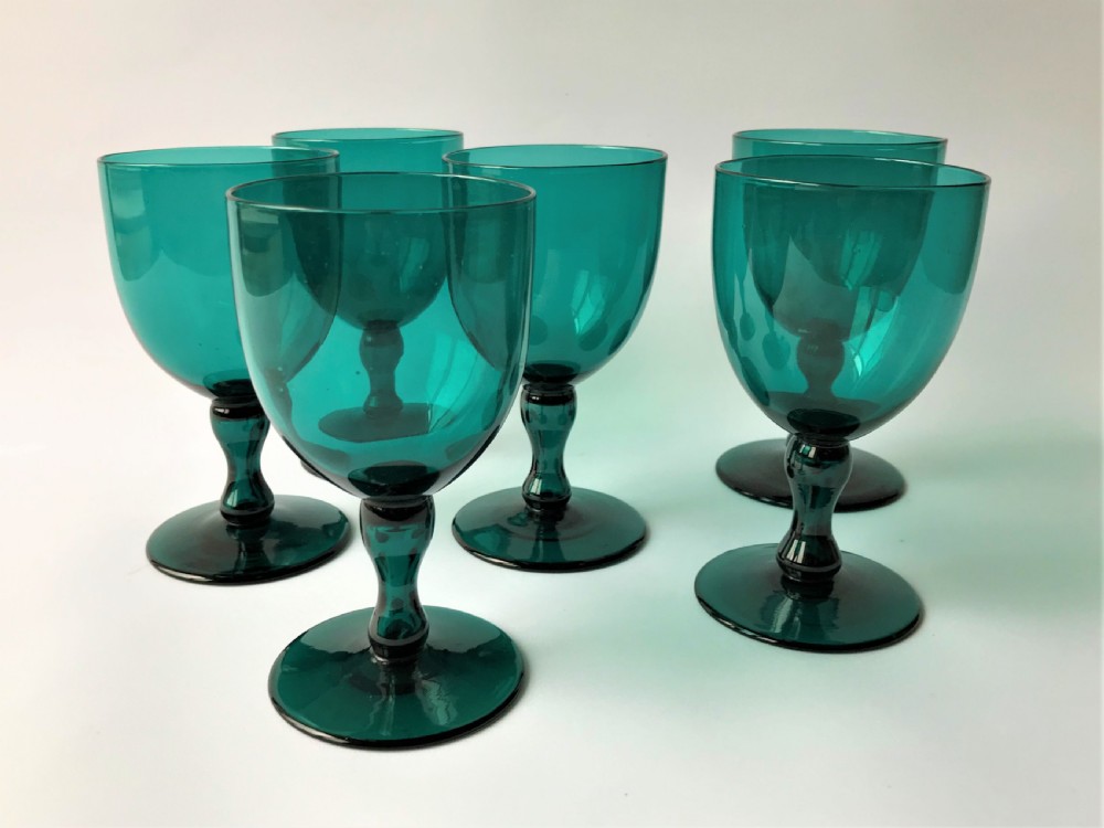 A fine set of Victorian Bristol Green/aqua wine glasses View III