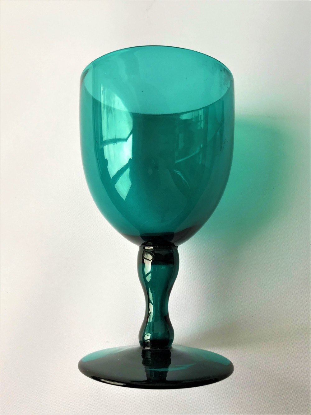 A fine set of Victorian Bristol Green/aqua wine glasses View V
