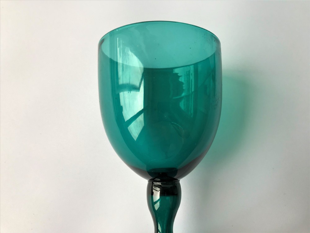 A fine set of Victorian Bristol Green/aqua wine glasses View VII
