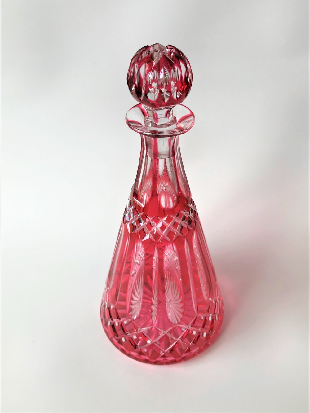 A lovely Victorian cranberry cut glass deanter View II