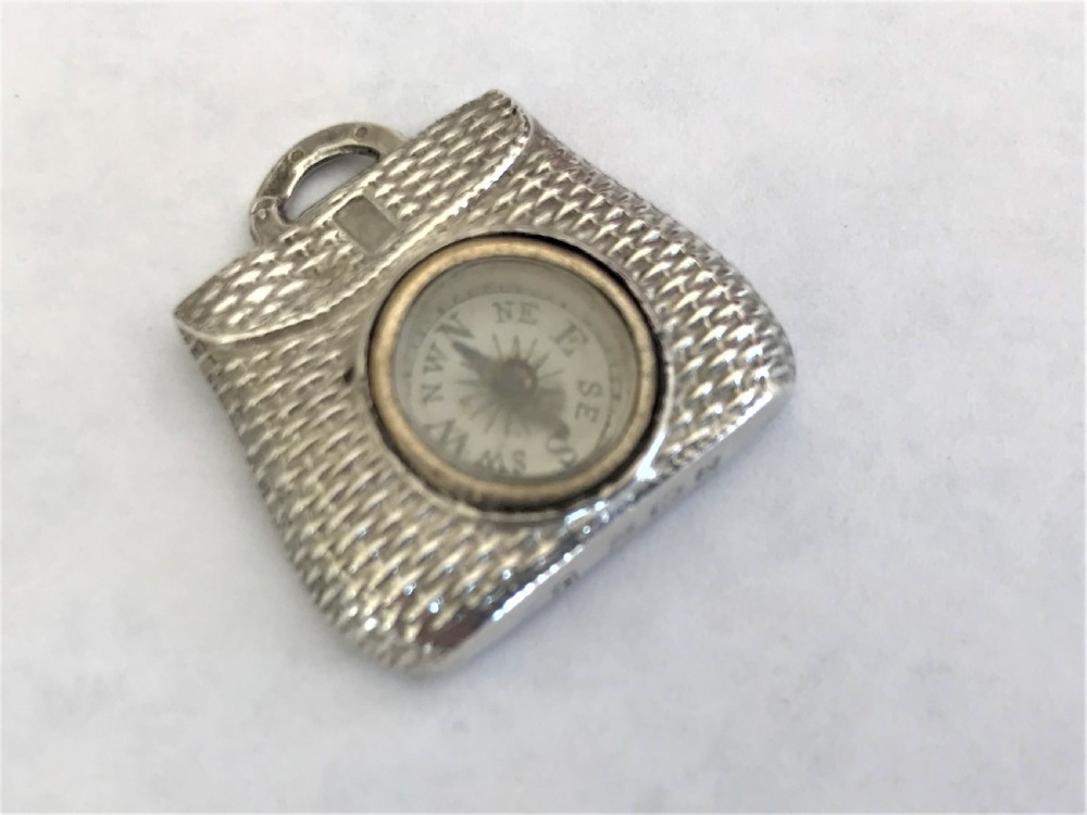 A rare Edwardian silver fishing interest 'creel' fob compass View II