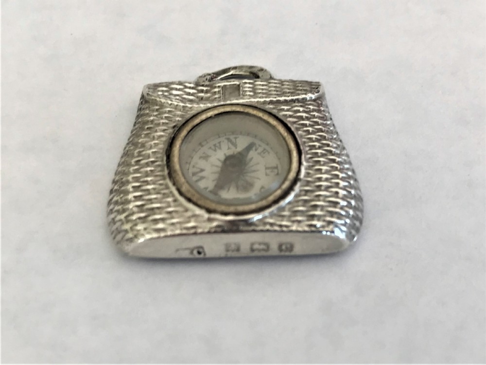 A rare Edwardian silver fishing interest 'creel' fob compass View V