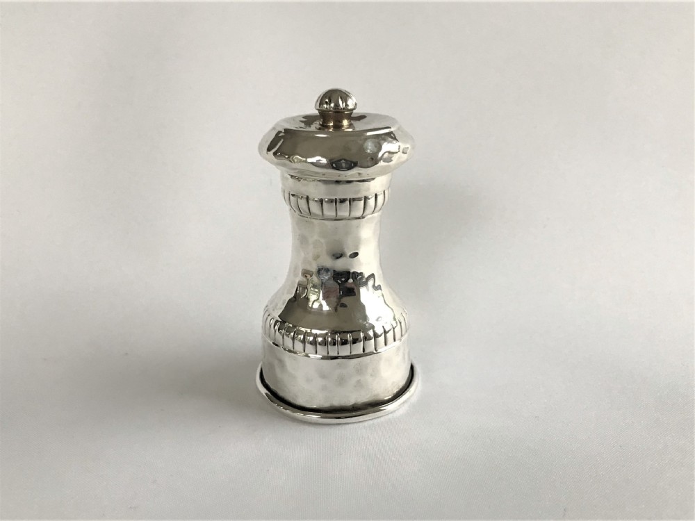 A superb Arts & Crafts silver pepper grinder View II