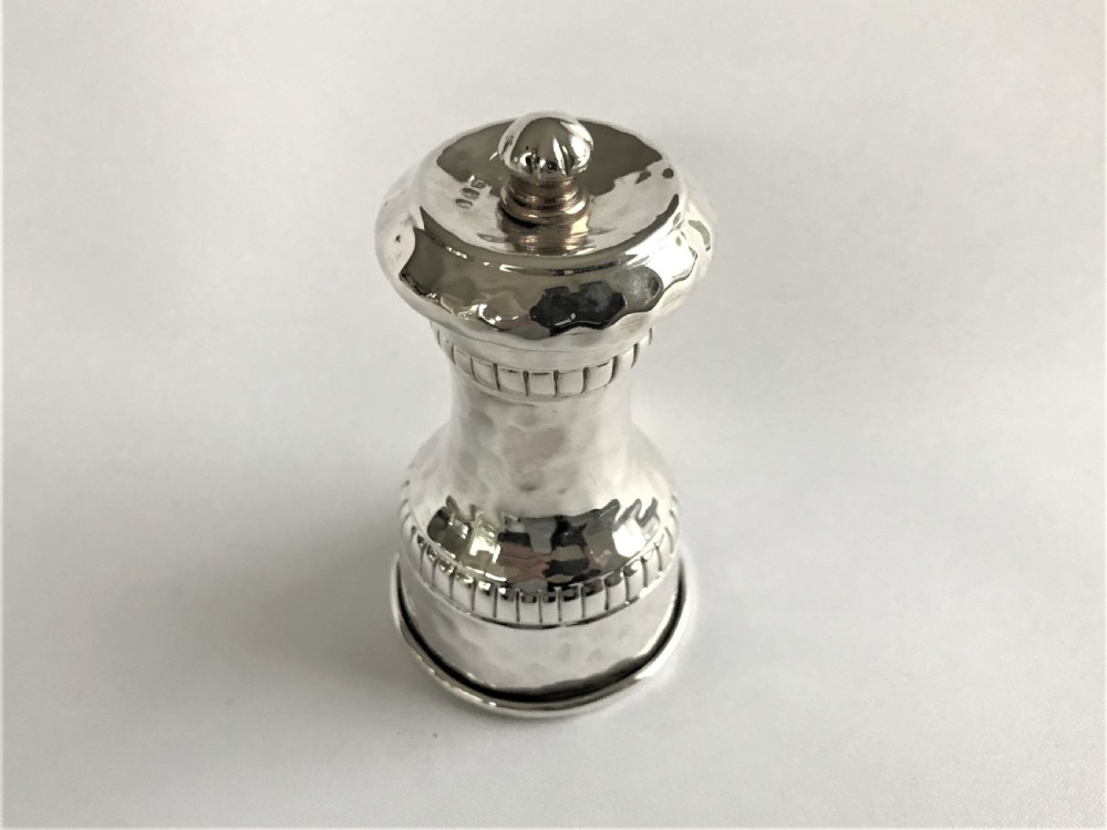 A superb Arts & Crafts silver pepper grinder View III