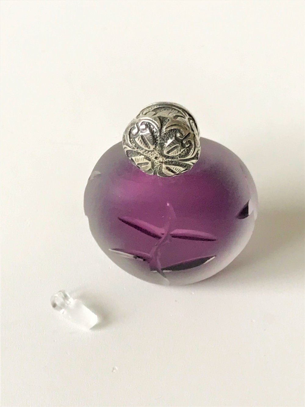 A gorgeous Victorian silver mounted amethyst glass scent bottle View V