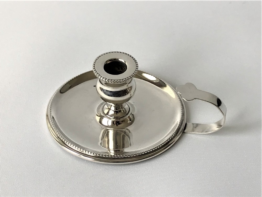 A small Edwardian silver go-to-bed chamber stick View II