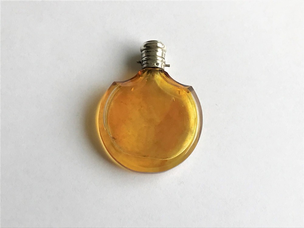 A lovely French silver mounted amber scent bottle
