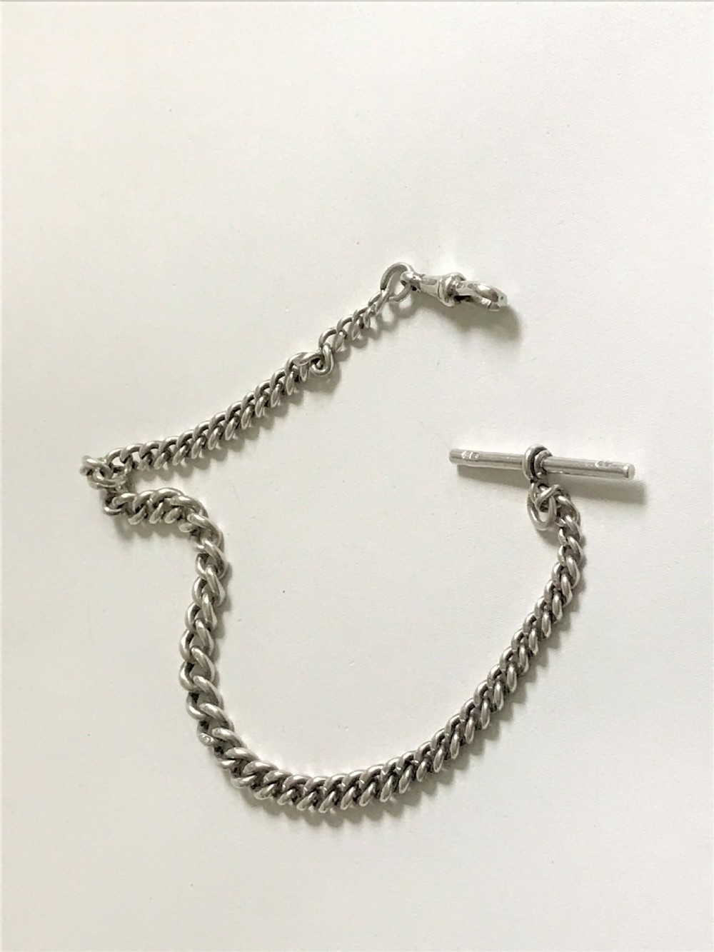 A heavy and graduated Victorian silver fob chain