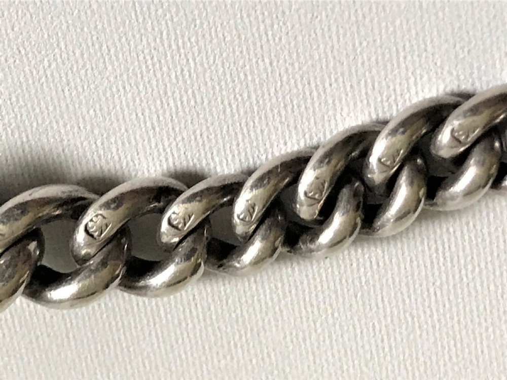 A heavy and graduated Victorian silver fob chain View III