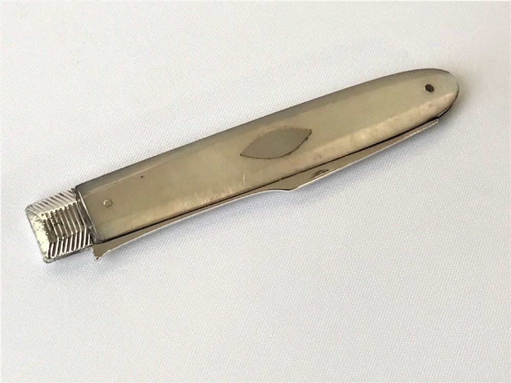 A late 18th Century silver folding fruit fork View III