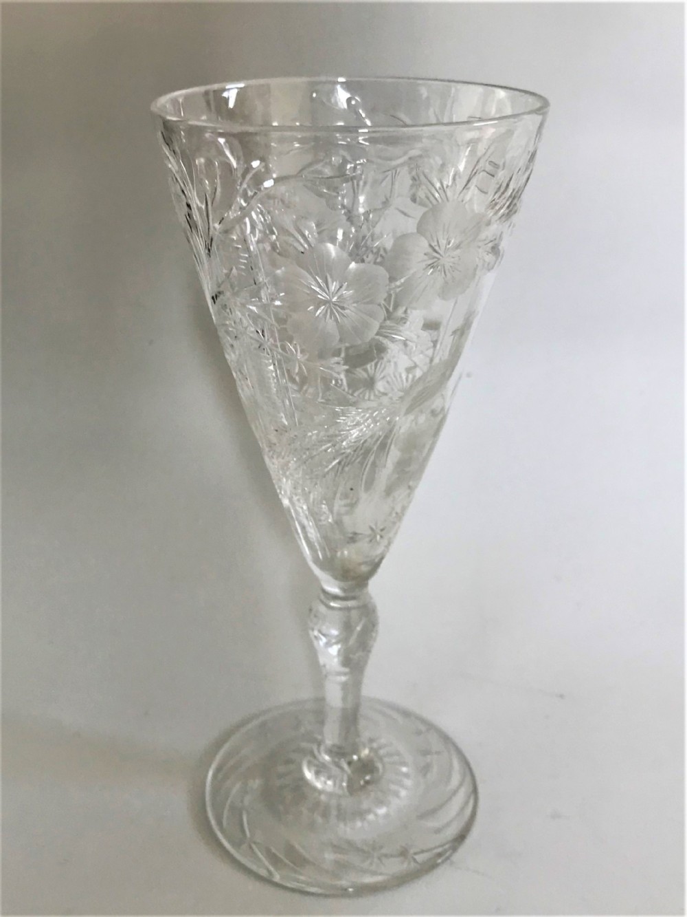 A fabulous rock crystal cut Aesthetic Movement wine flute