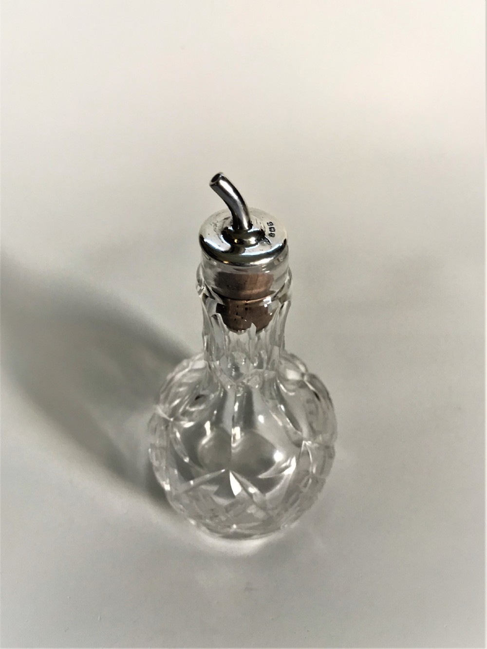 A charming silver mounted Angostura bitters jigger View III