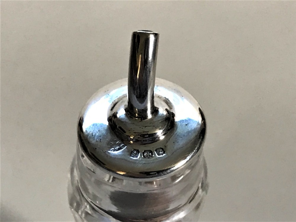 A charming silver mounted Angostura bitters jigger View IV