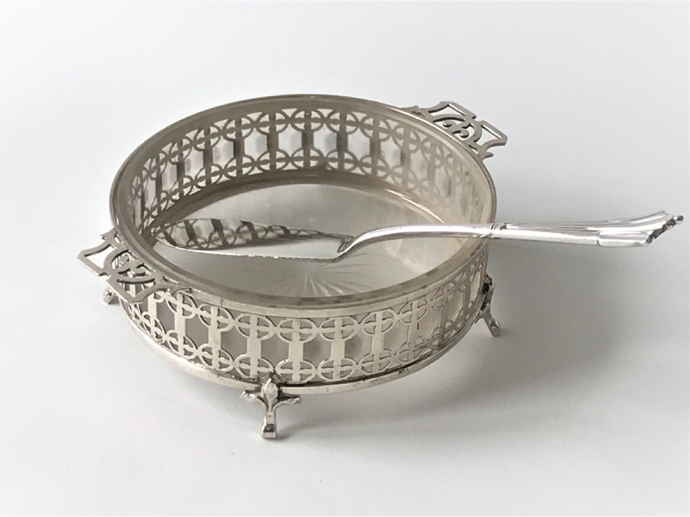 A gorgeous pierced silver butter dish & knife