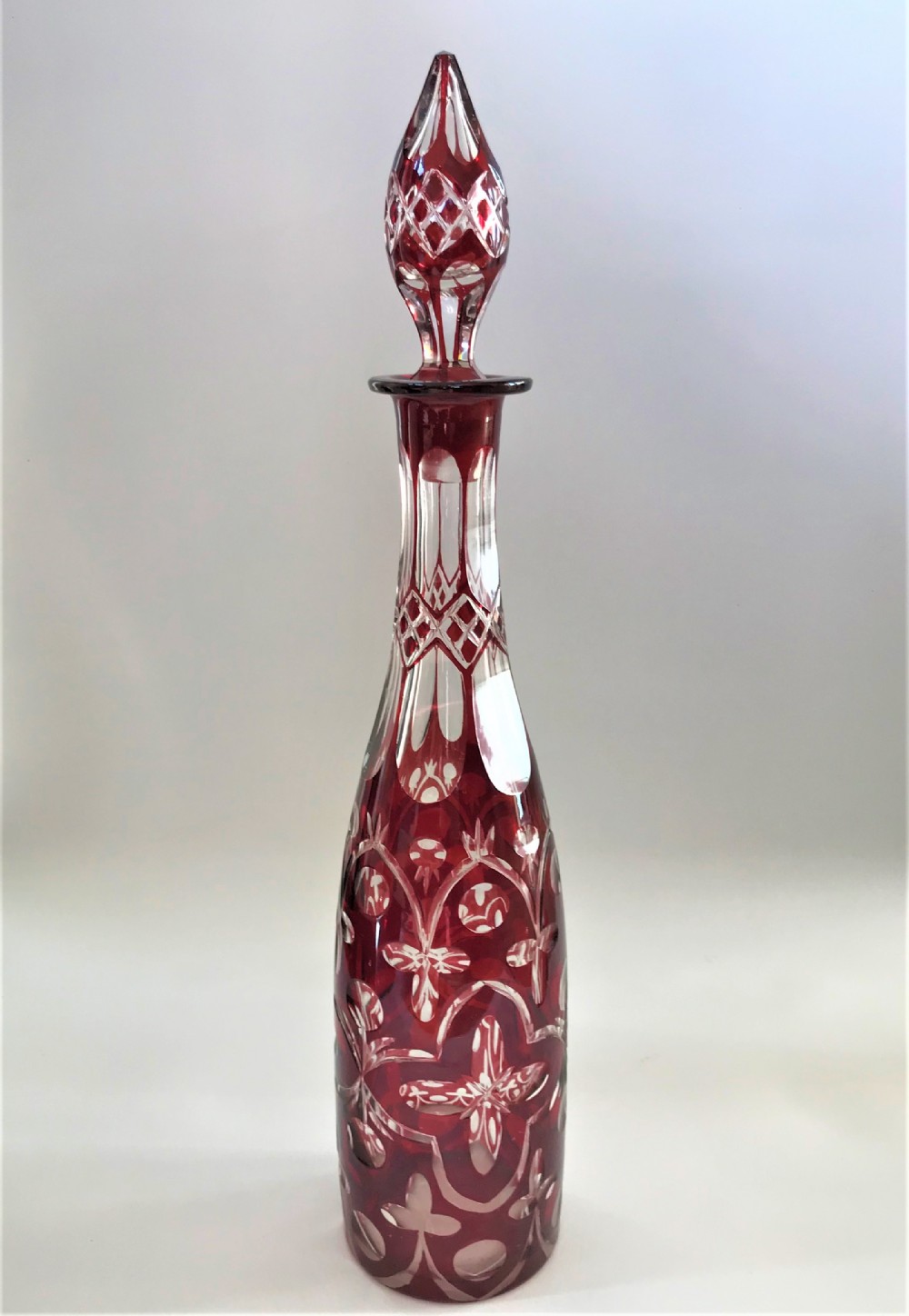 A Victorian Ruby flashed cut glass decanter
