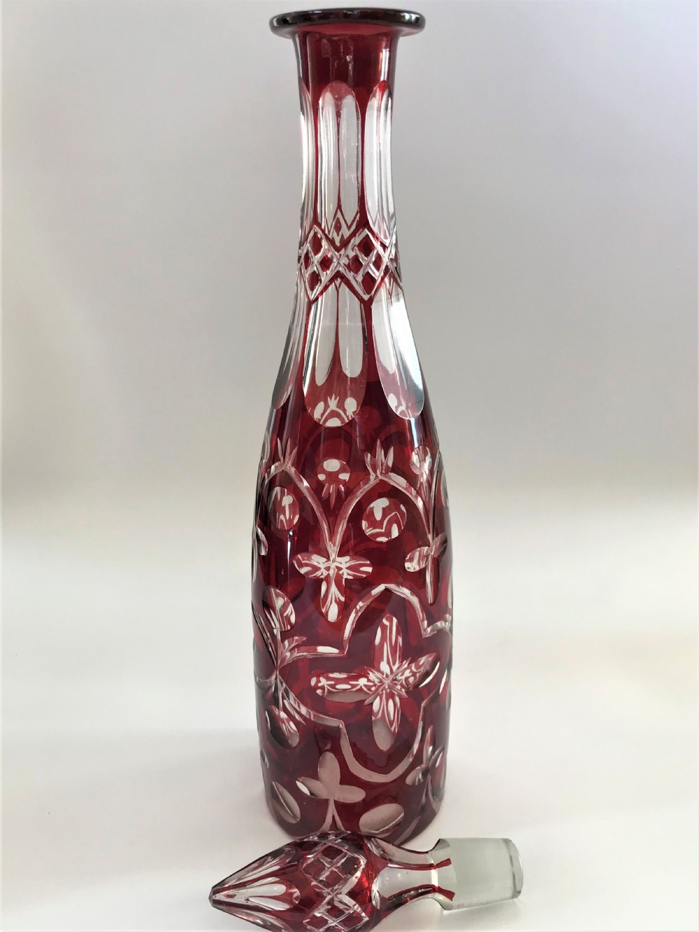 A Victorian Ruby flashed cut glass decanter View IV