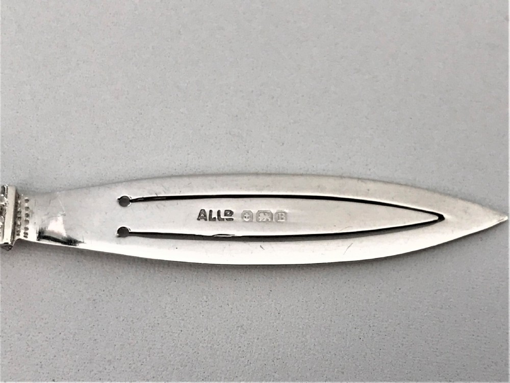 A rare silver 'thumbs up' good luck bookmark View IV