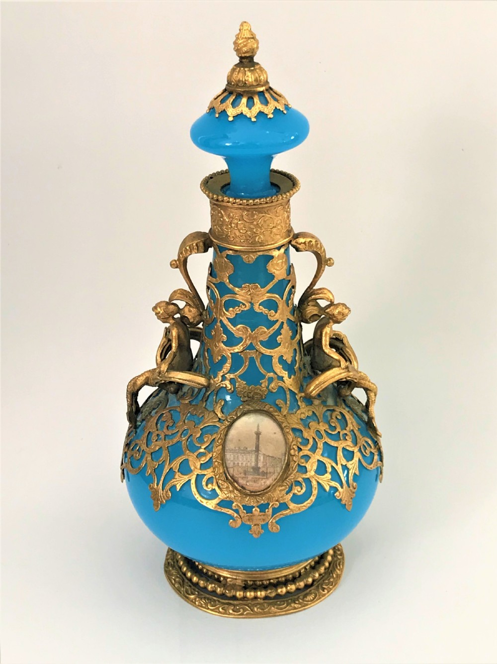 An outstanding Palais Royale ormolu and opaline glass cologne bottle