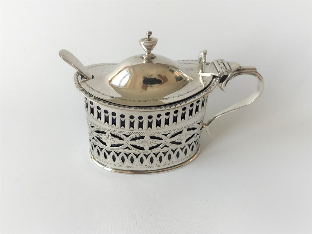 A lovely Chester silver mustard pot & spoon View V