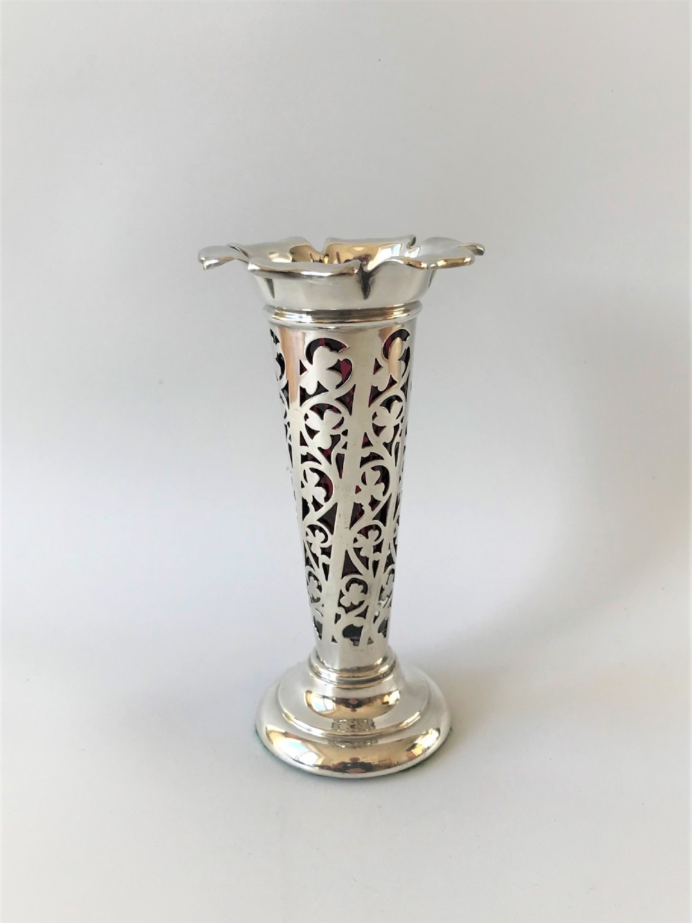 A lovely Edwardian silver & cranberry glass trumpet vase