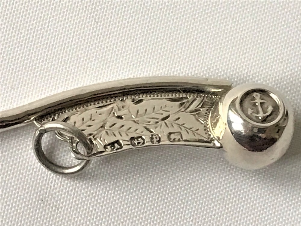 A rare miniature Victorian silver Bosun's whistle View III