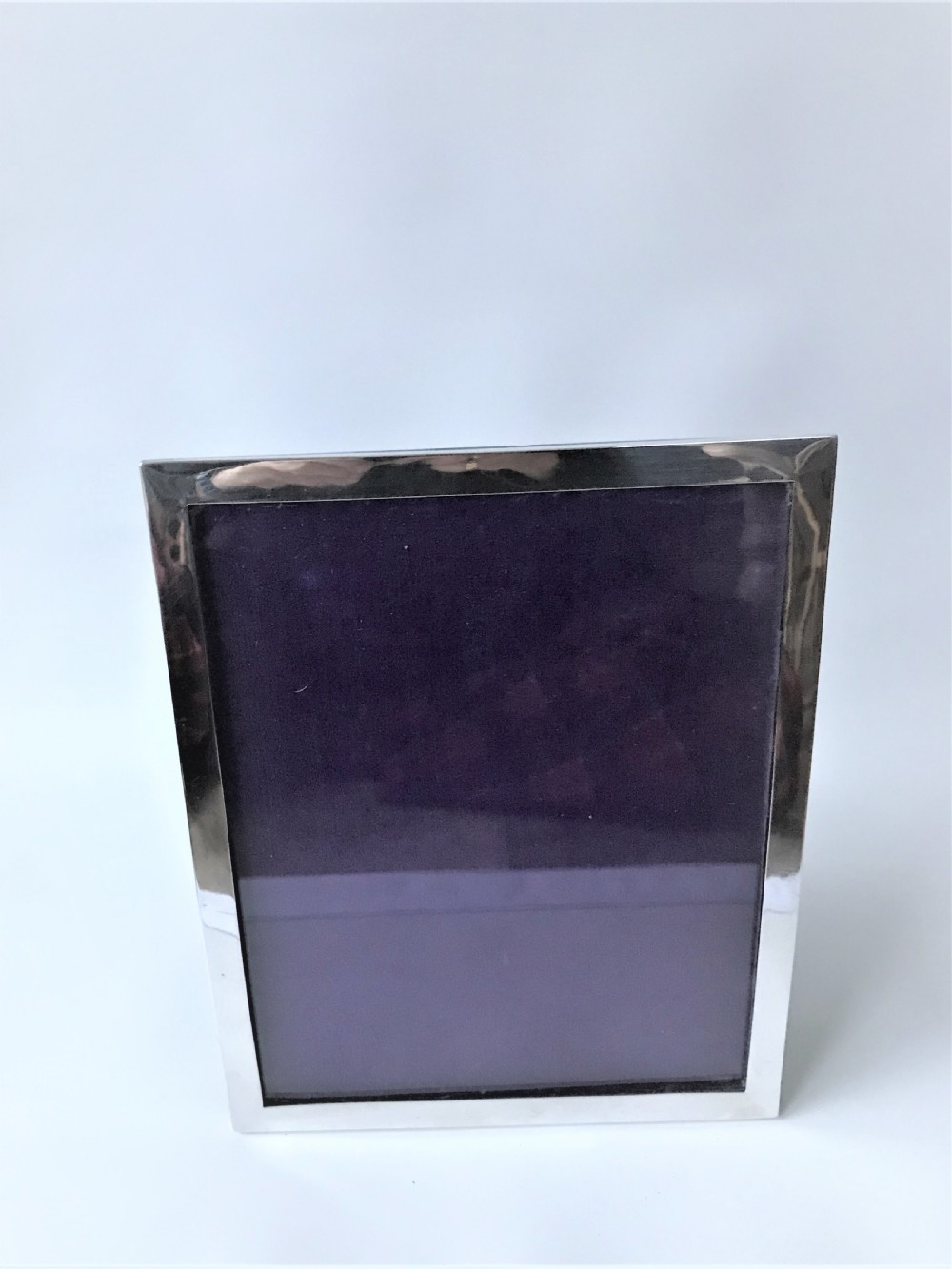 A large rectangular silver photo frame View IV