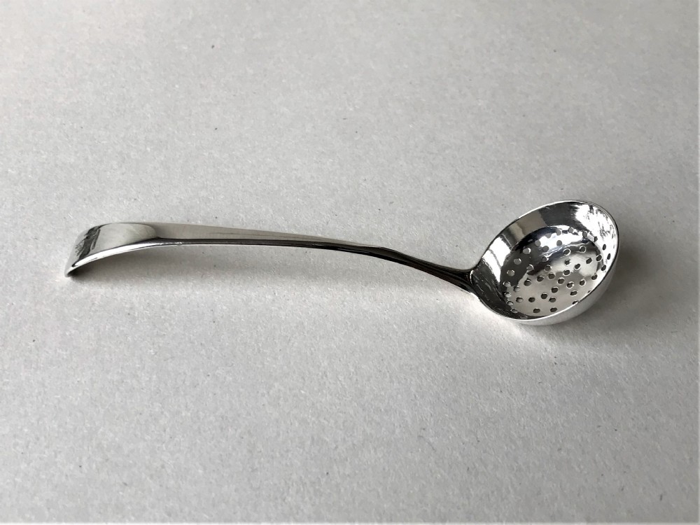 A rare 18th Century silver spice sifting ladle