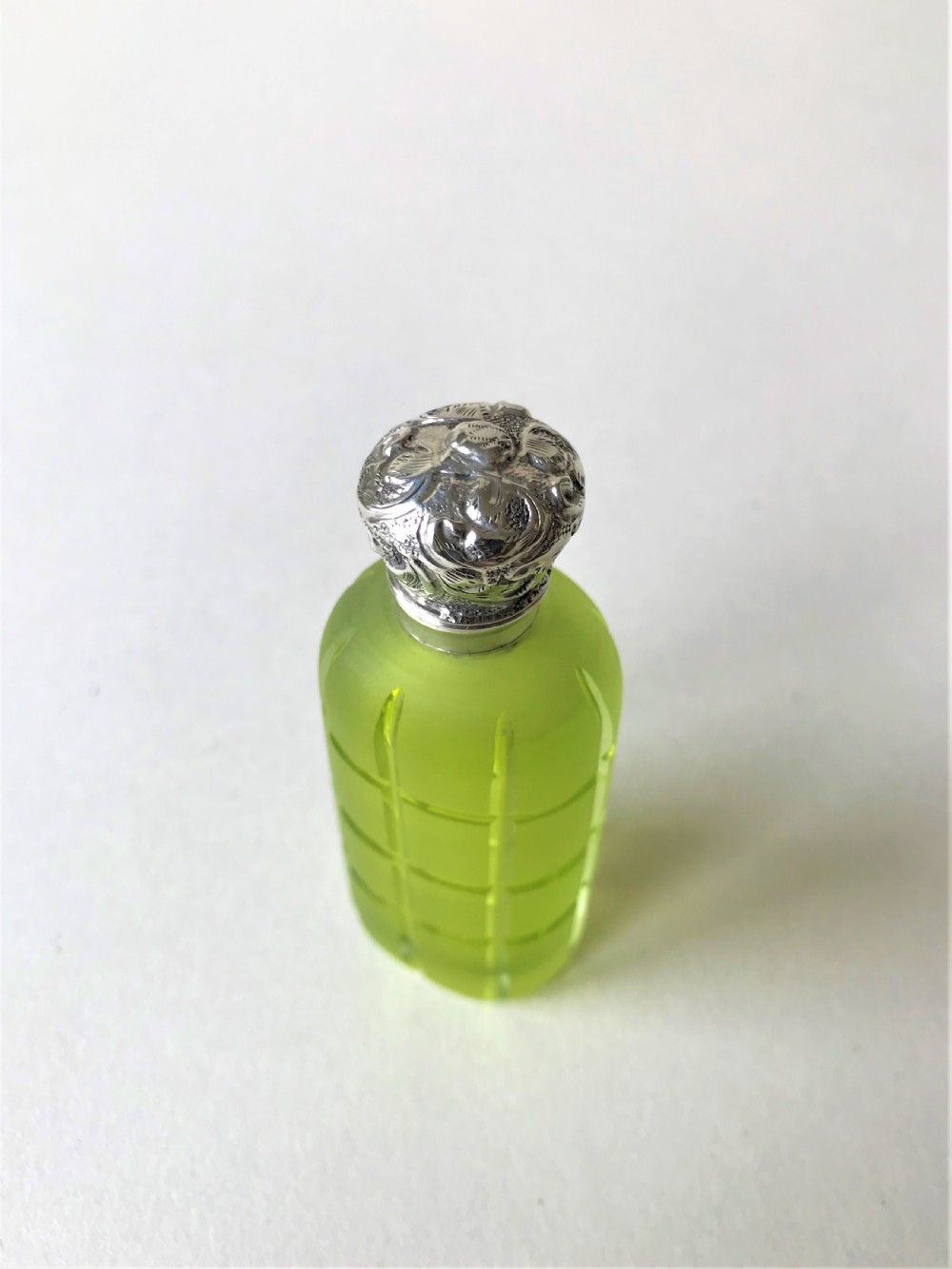 A stunning acid green silver mounted scent bottle View II