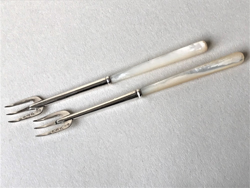 A pair of Victorian Chester silver pickle forks View III