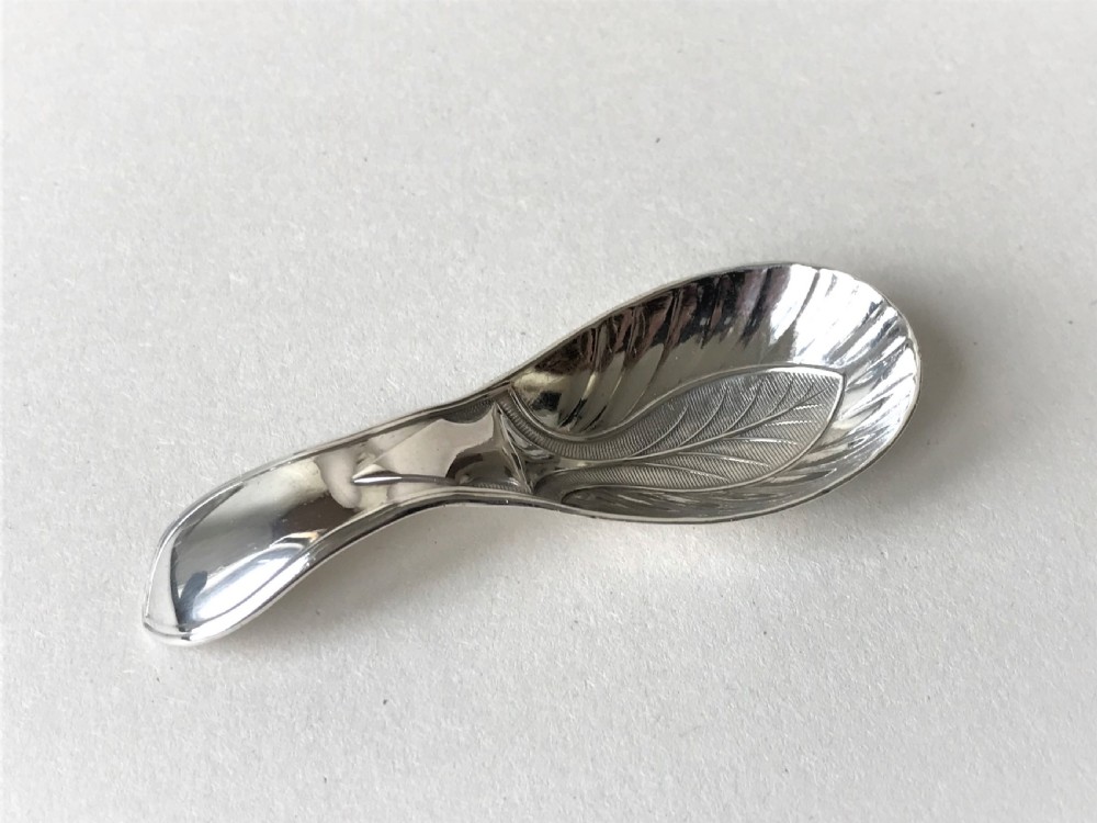 A rare early Sheffield silver leaf shaped caddy spoon