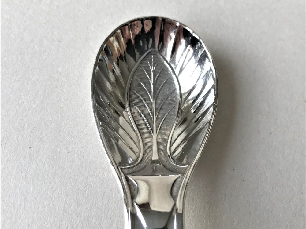 A rare early Sheffield silver leaf shaped caddy spoon View III