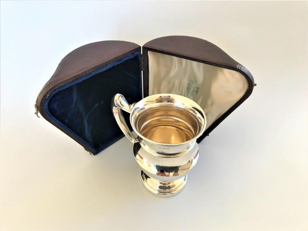 A superb boxed silver Christening mug View IX