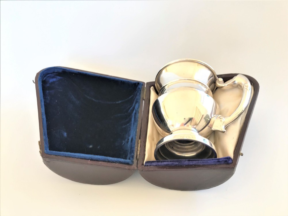 A superb boxed silver Christening mug View X