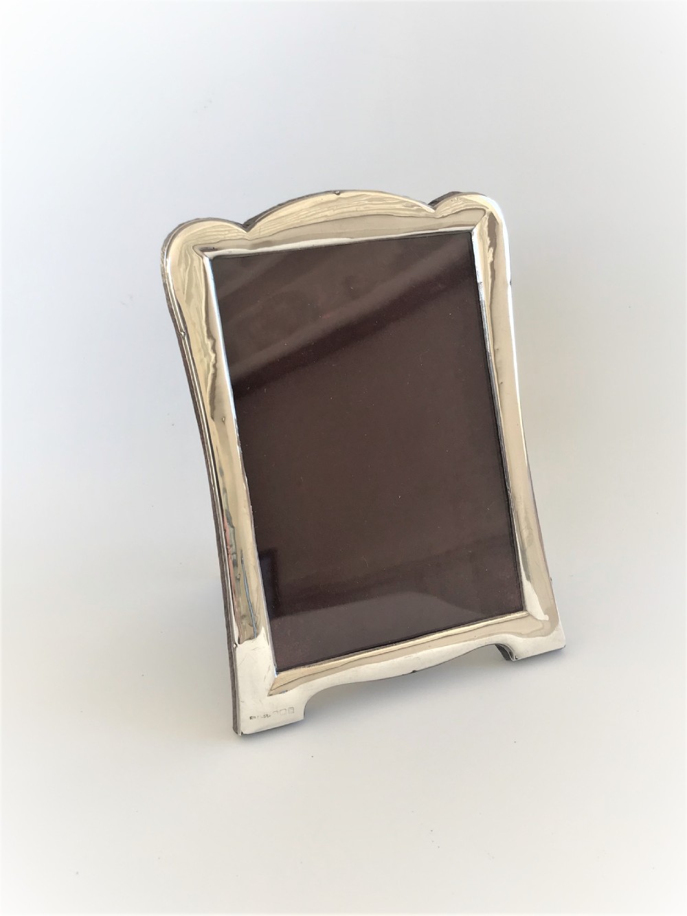A stylish George V silver photo frame