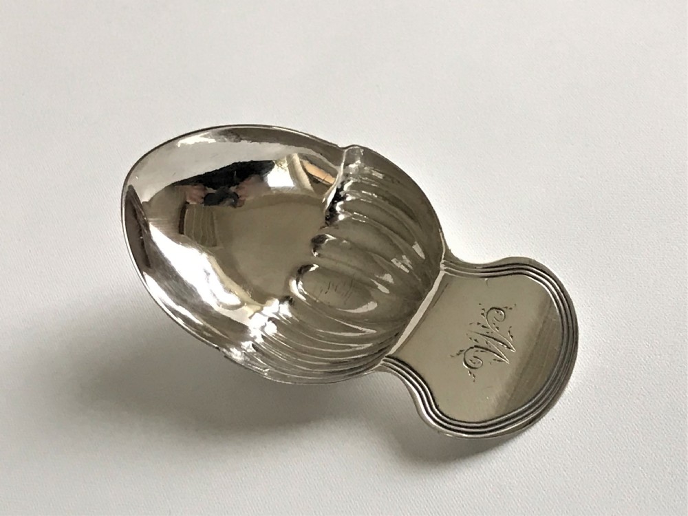 An extremely rare Georgian silver acorn caddy spoon