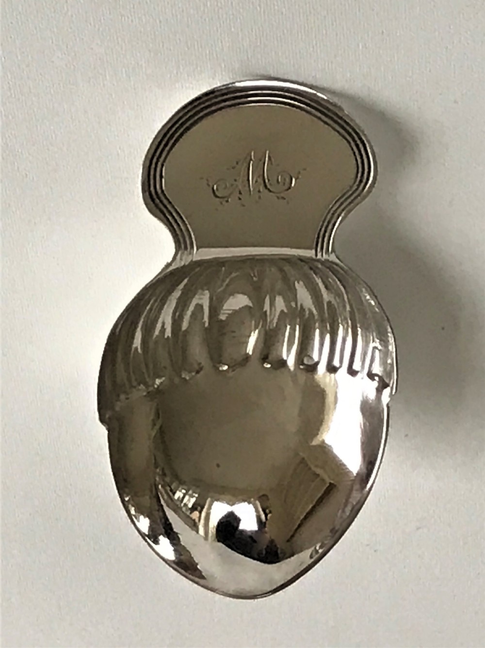 An extremely rare Georgian silver acorn caddy spoon View IV