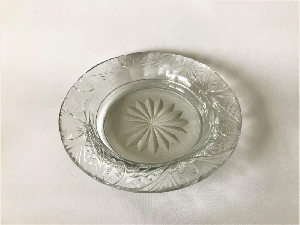 A superb Georgian cut glass wine bottle/decanter coaster