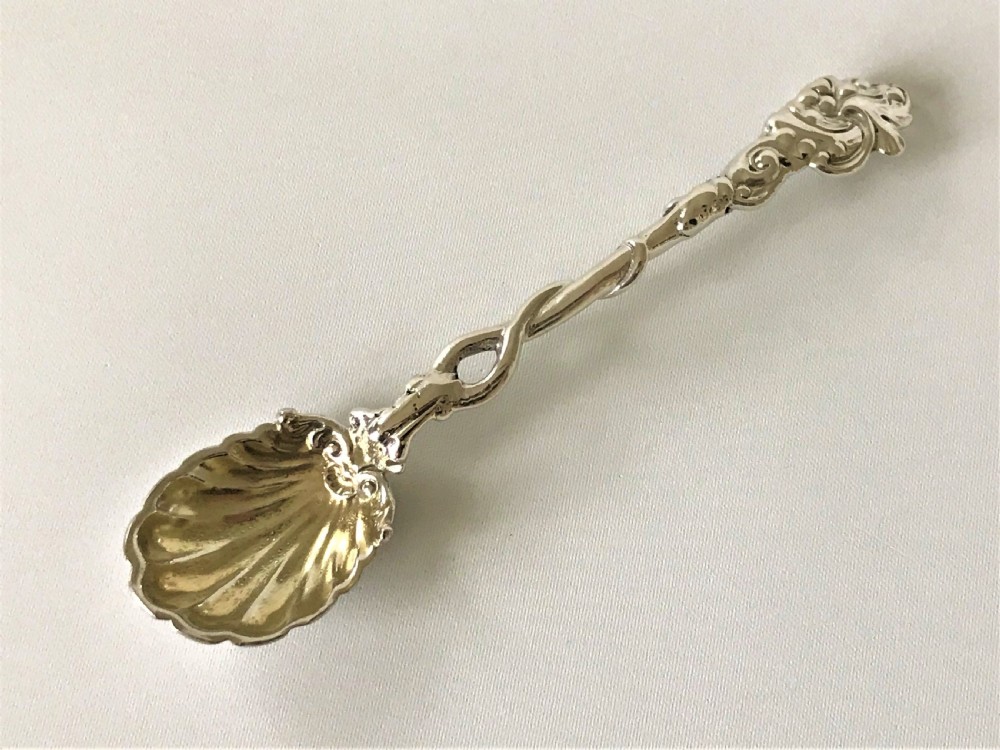 A superb early 19th Century cast silver condiment spoon