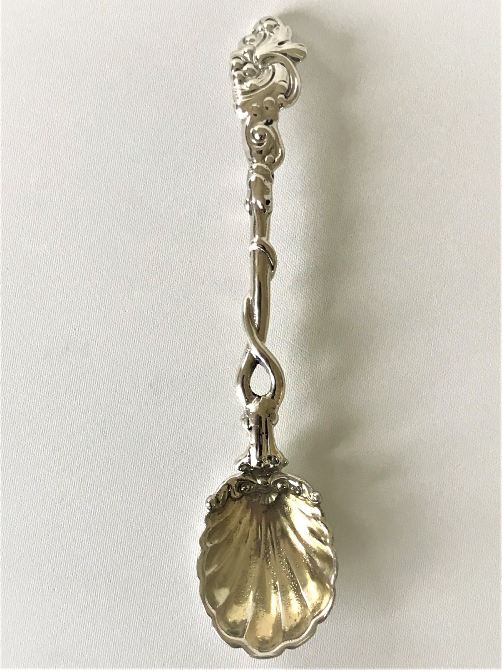 A superb early 19th Century cast silver condiment spoon View II